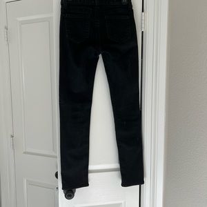 Black denim straight leg jeans.